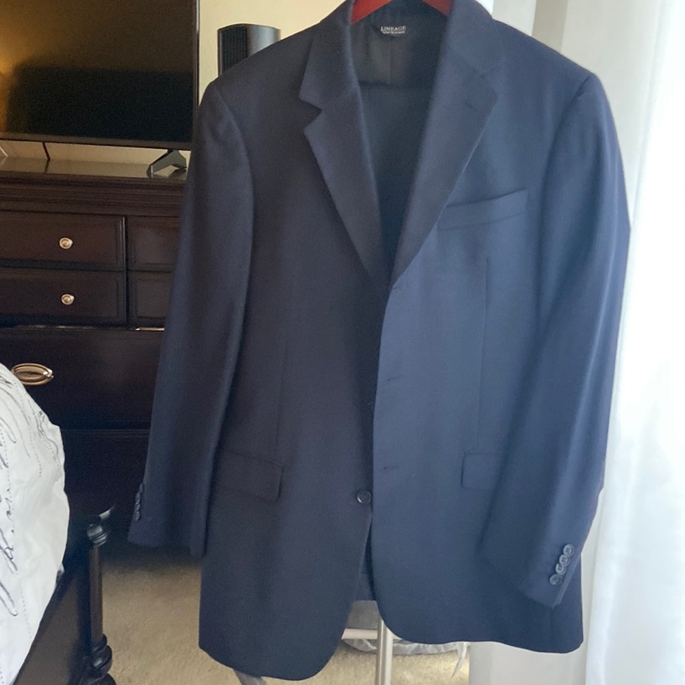 Men’s light striped navy blue dress suit